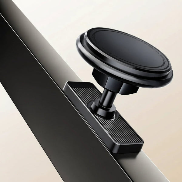 Black magnetic phone holder with wipes and adapter ring packaging on a beige background